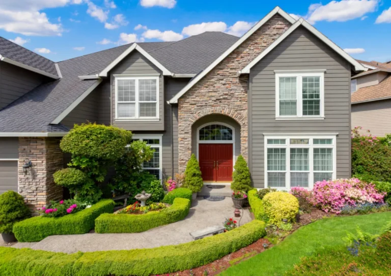 a-home-with-gray-siding-scaled-e1754334205838