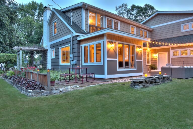 roofing citrus springs fl Beautiful restored Cape Cod style house exterior at dusk