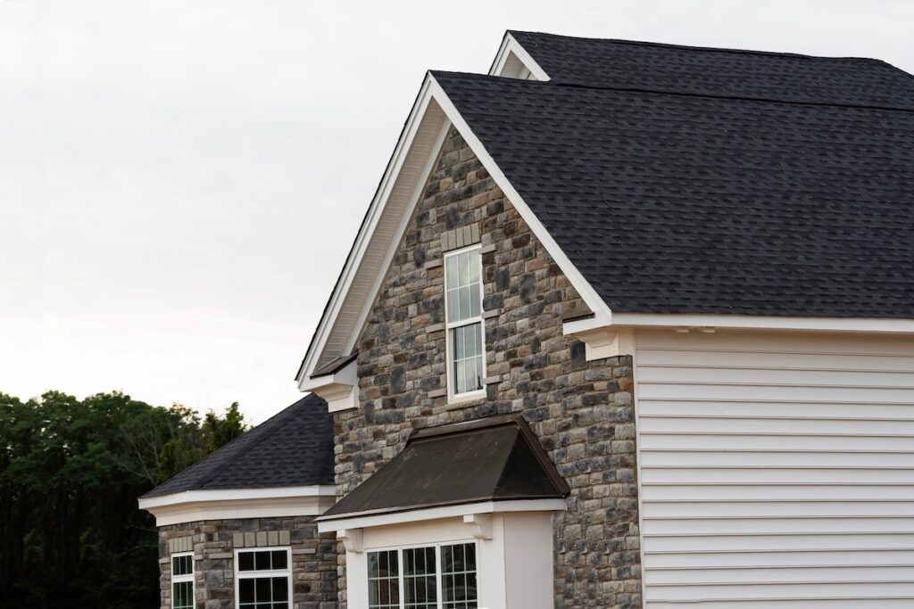 how to measure a roof for shingles edge of roof shingles on top of the house dark asphalt tiles on the roof background color