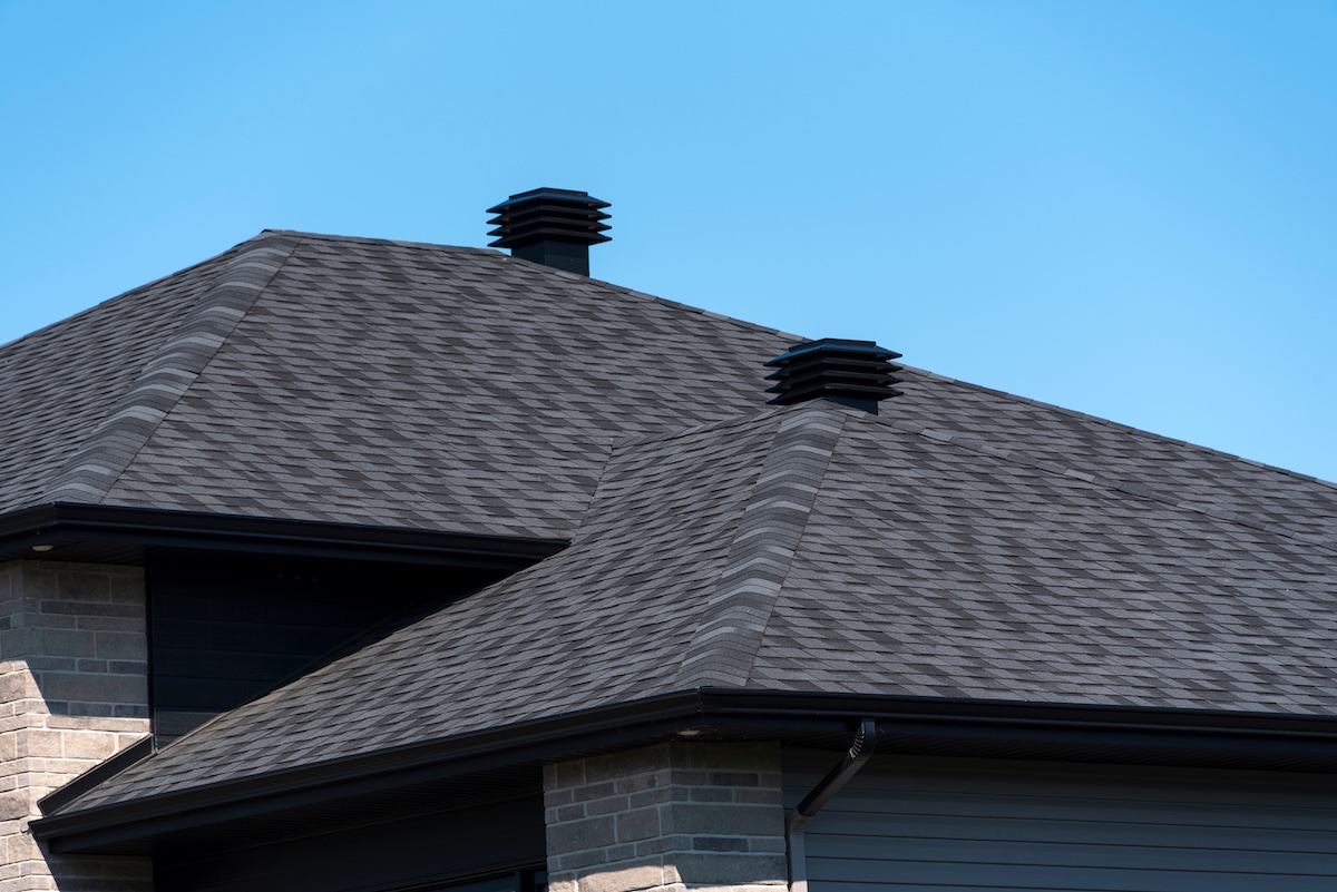 Ventilation covers on a new house shingle roof