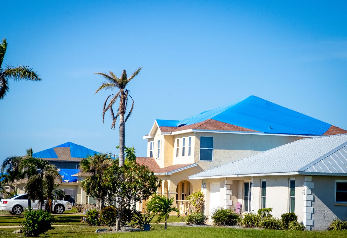 roof insurance claim florida white car hurricane cover big house roof